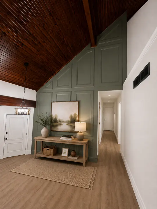 Entryway with sage green paneled wall, console table and wood ceiling